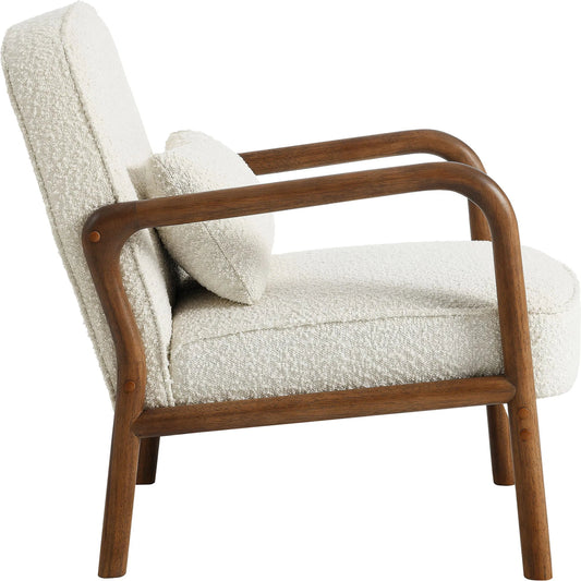 Independent Boucle Armchair by Evans & Londeen in ivory. Made from boucle upholstered in a unique style.