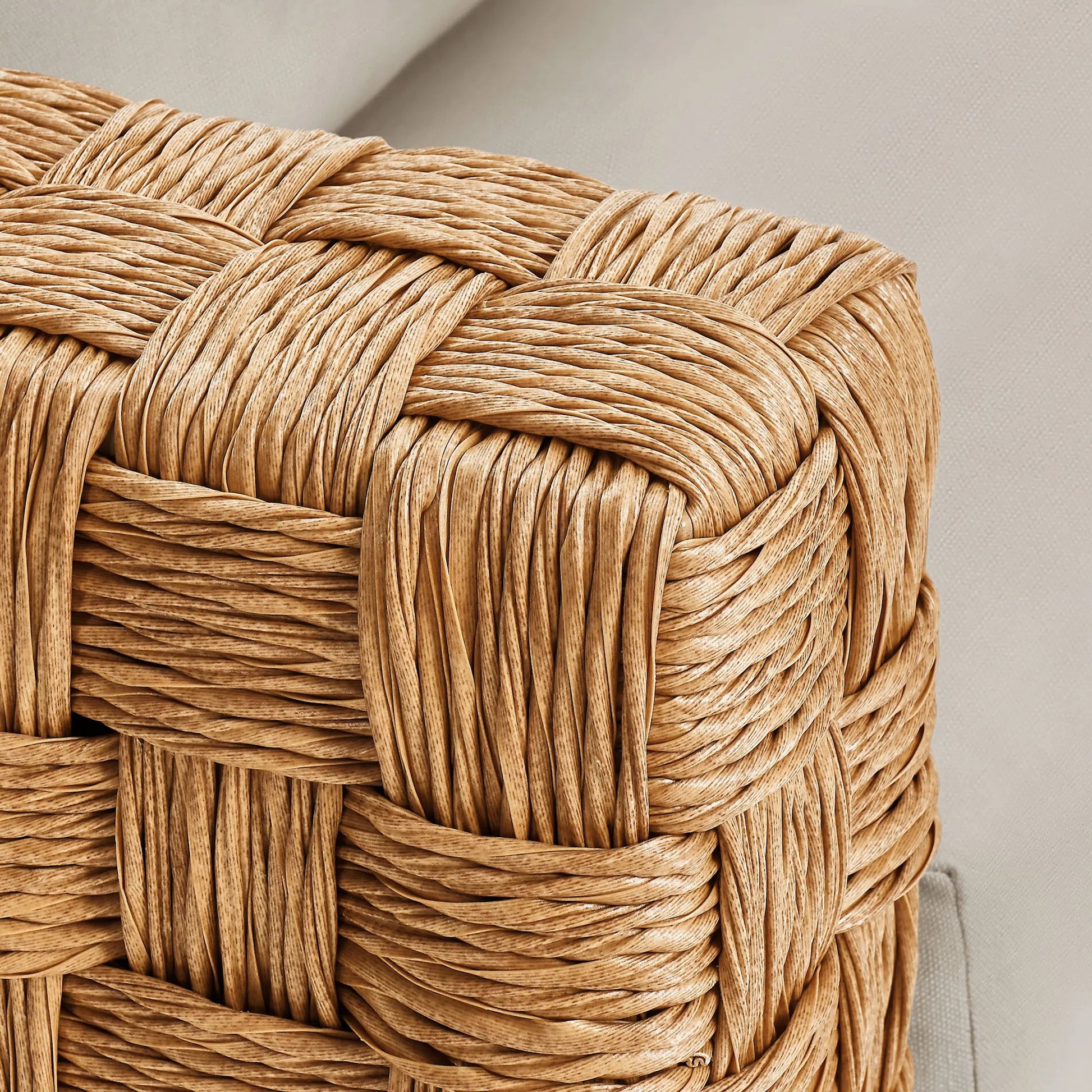 Volusia Rattan Loveseat by Evans & Londeen in natural light gray. Made from rattan in a rustic style.