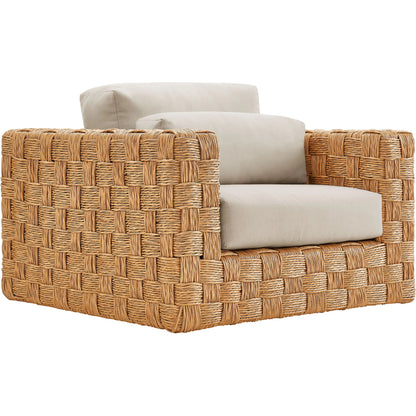 Volusia Rattan Armchair by Evans & Londeen in natural light gray. Made from rattan in a rustic style.