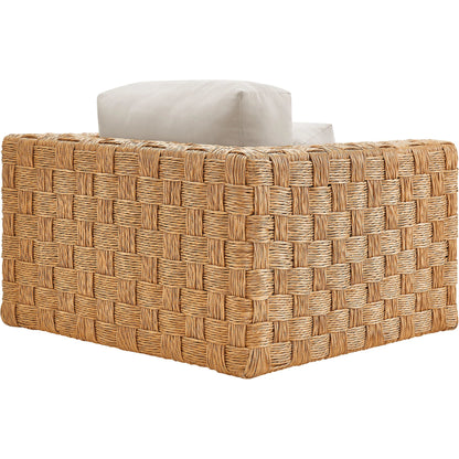 Volusia Rattan Armchair by Evans & Londeen in natural light gray. Made from rattan in a rustic style.