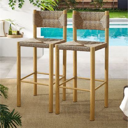 Spink Rattan and Aluminum Bar Stools (Set of 2) by Evans & Londeen. Made from rattan, aluminum in a rustic style.