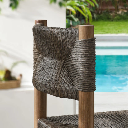 Spink Rattan and Aluminum Bar Stools (Set of 2) by Evans & Londeen. Made from rattan, aluminum in a rustic style.
