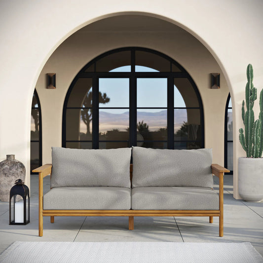 Osawatomie Outdoor Teak Wood Sofa by Evans & Londeen. Made from teak wood in a unique style.