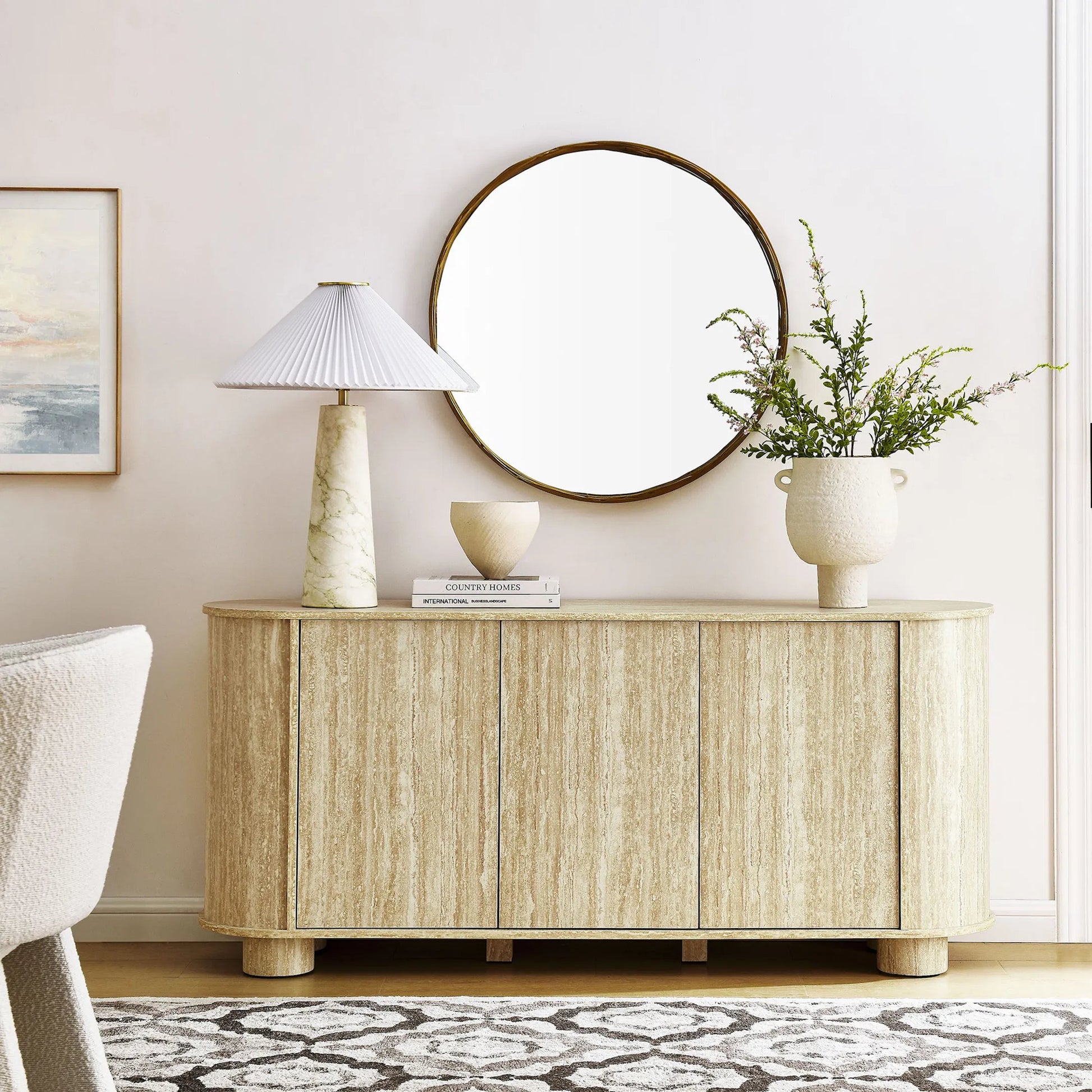 Chase 63” Oval Faux Travertine Sideboard by Evans & Londeen in travertine. Made from faux travertine in a unique style.