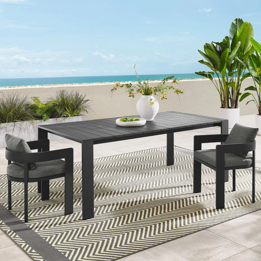 Conejos Rectangular Outdoor Dining Table by Evans & Londeen in gray. Made from aluminum in a unique style.