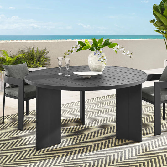 Conejos Round Outdoor Dining Table by Evans & Londeen in gray. Made from aluminum in a unique style.