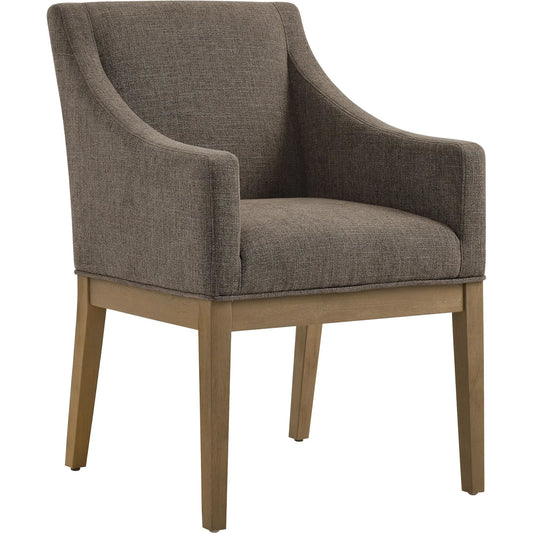 Williamson Dining Armchair by Evans & Londeen. Made from fabric upholstered in a unique style.