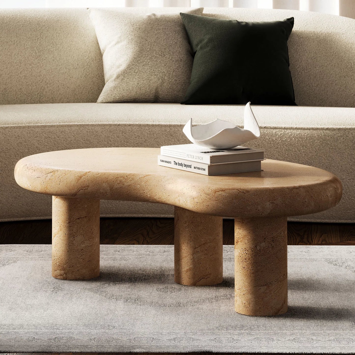 011 SI-2358293 | Lifestyle | Maury Indoor - Textured Faux Travertine Coffee Table by Evans & Londeen in travertine. Made from textured faux travertine in a transitional style.