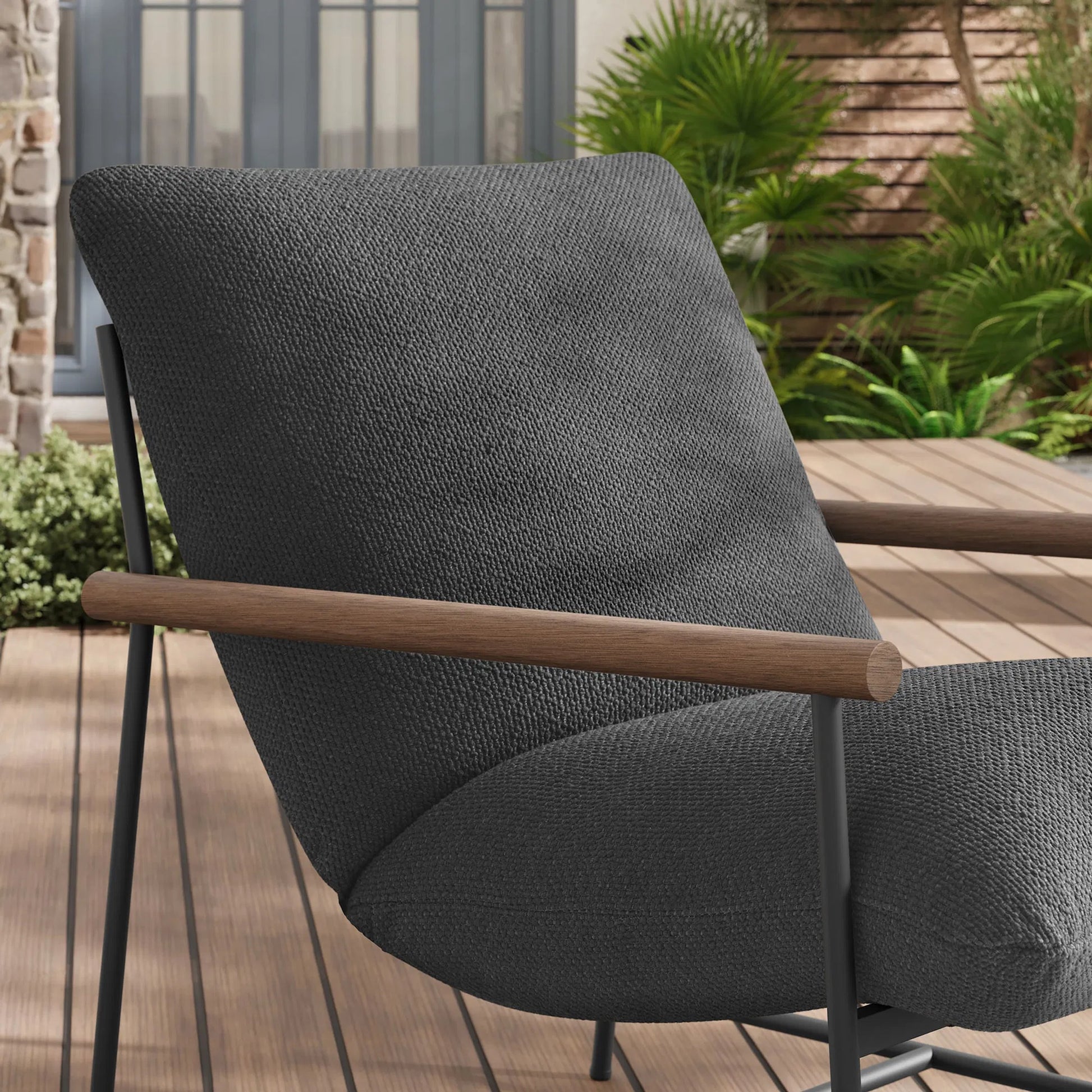Iron Boucle Sling Lounge Chair by Evans & Londeen. Made from boucle in a transitional style.