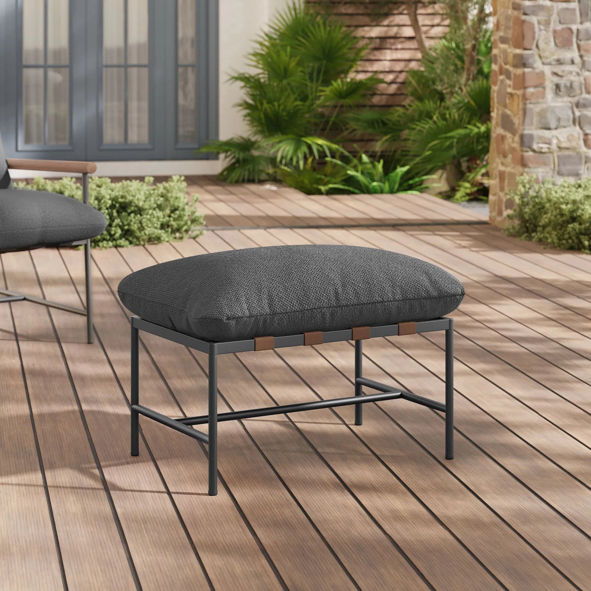 Iron Boucle Ottoman by Evans & Londeen. Made from boucle in a transitional style.