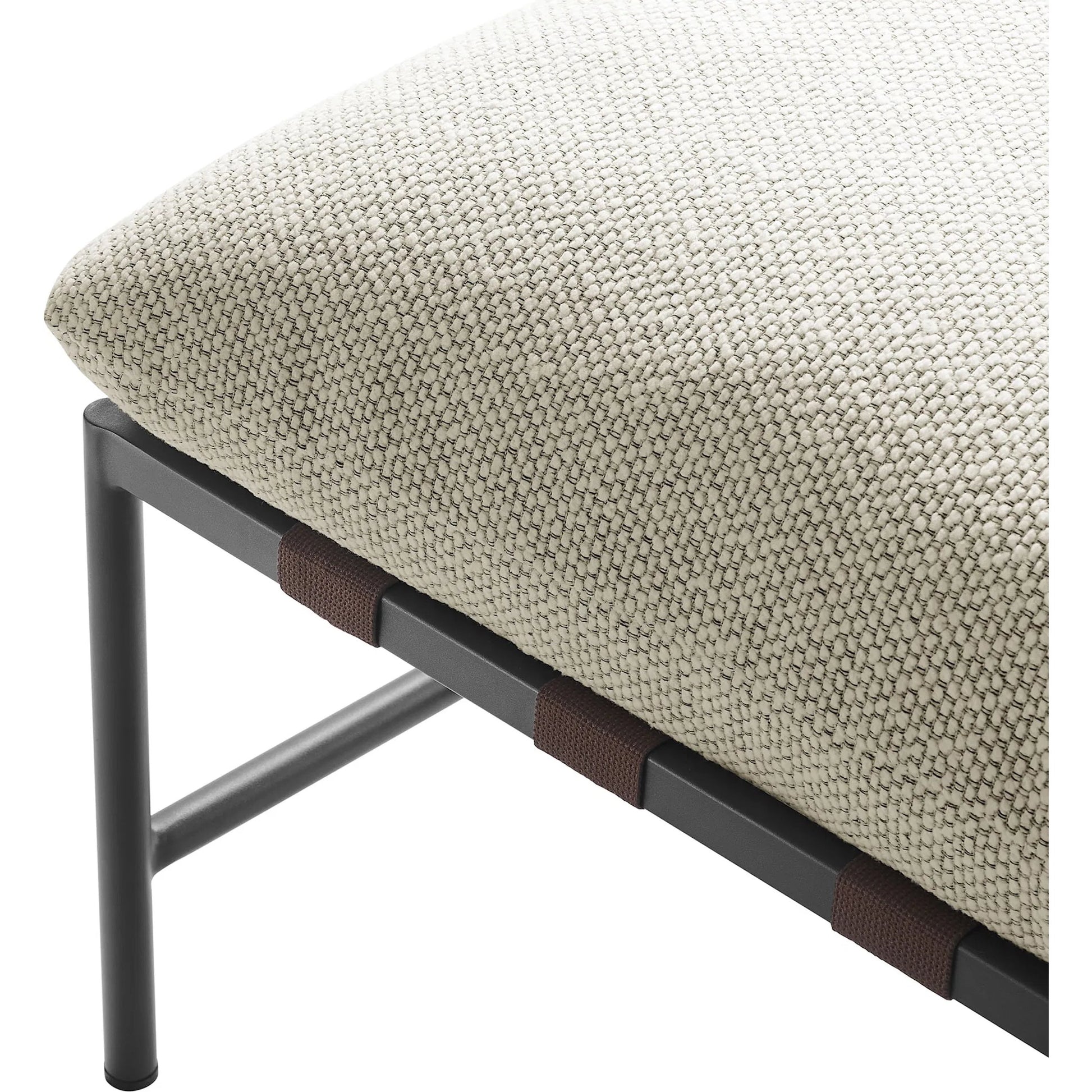 Iron Boucle Ottoman by Evans & Londeen. Made from boucle in a transitional style.