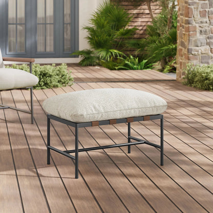 Iron Boucle Ottoman by Evans & Londeen. Made from boucle in a transitional style.