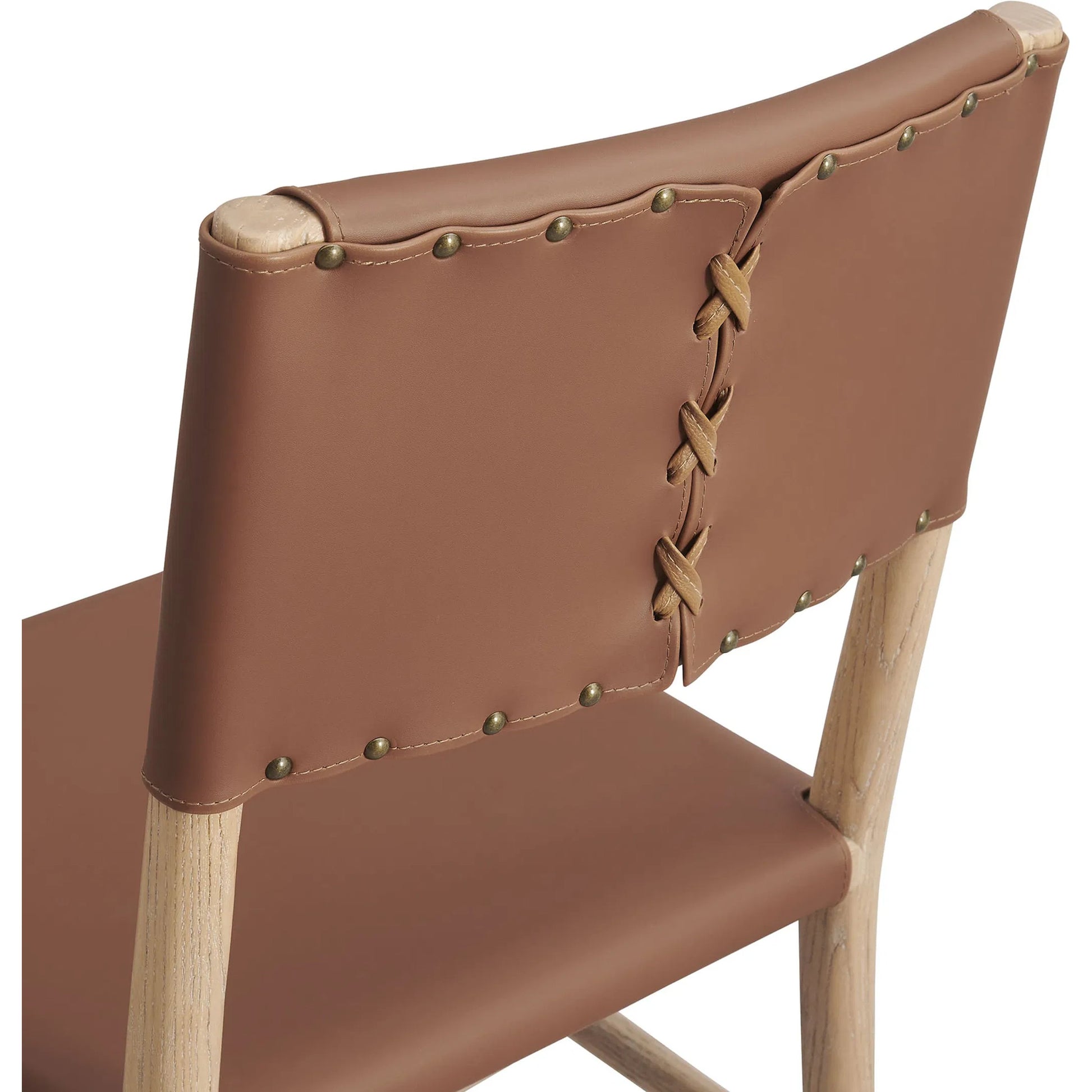 Greenville Wood Vegan Dining Side Chairs (Set of 2) by Evans & Londeen in natural. Made from vegan leather in a traditional style.