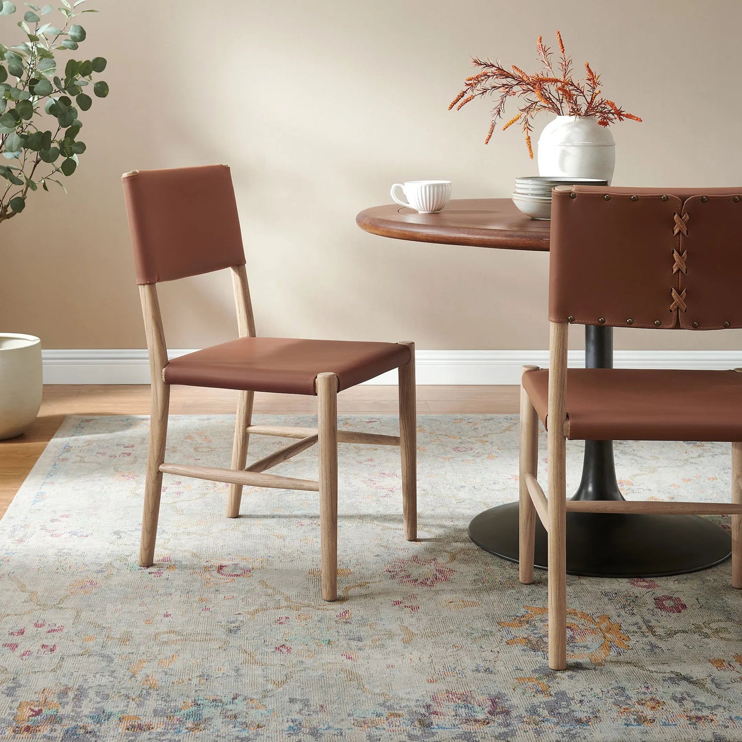 009 SI-2358569 | Lifestyle | Greenville Wood Vegan Dining Side Chairs (Set of 2) by Evans & Londeen in natural. Made from vegan leather in a traditional style.