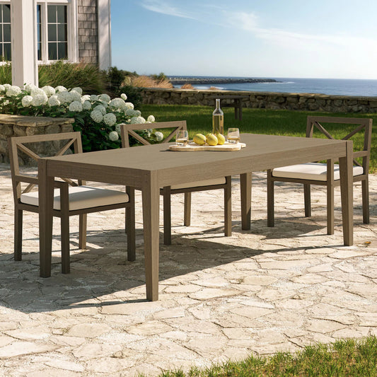 Galt 83" Rectangular Teak Dining Table by Evans & Londeen in weathered gray. Made from teak in a modern style.