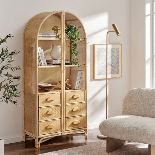 Kleberg 71 Inch Tall Arched Natural Rattan Bookshelf by Evans & Londeen. Made from natural rattan in a transitional style.