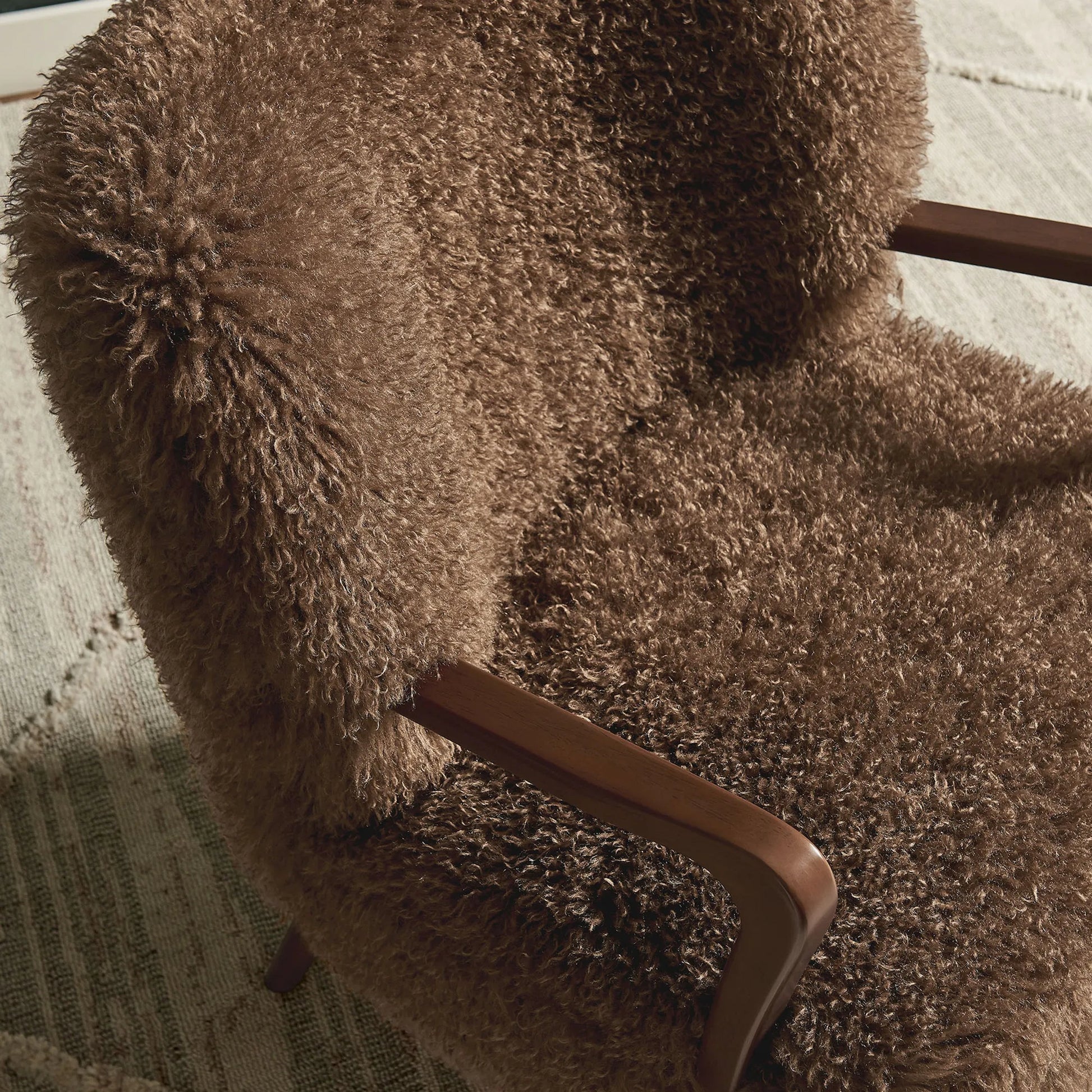 Edgar Faux Shearling Accent Armchair by Evans & Londeen. Made from faux shearling in a eclectic & global style.