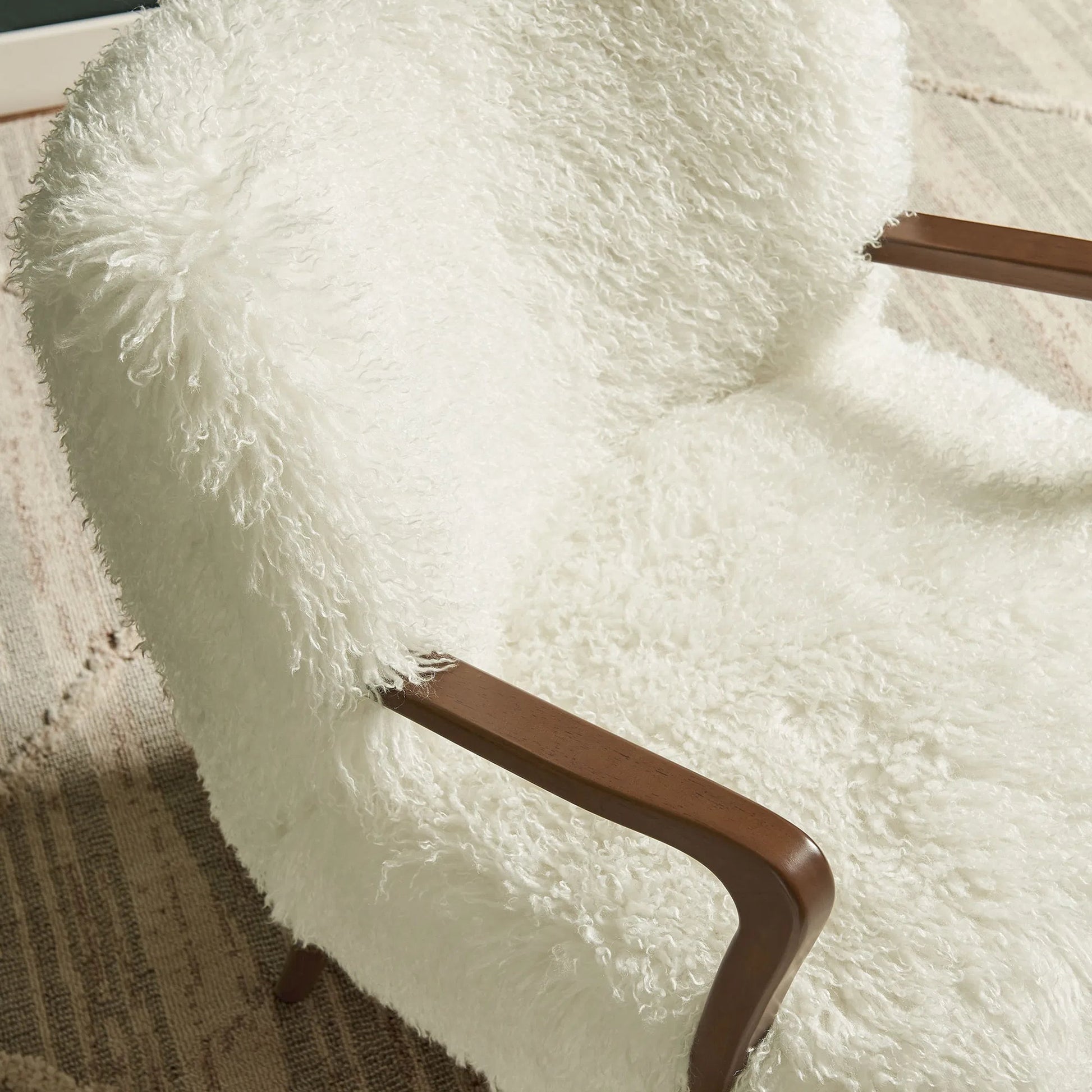 Edgar Faux Shearling Accent Armchair by Evans & Londeen. Made from faux shearling in a eclectic & global style.