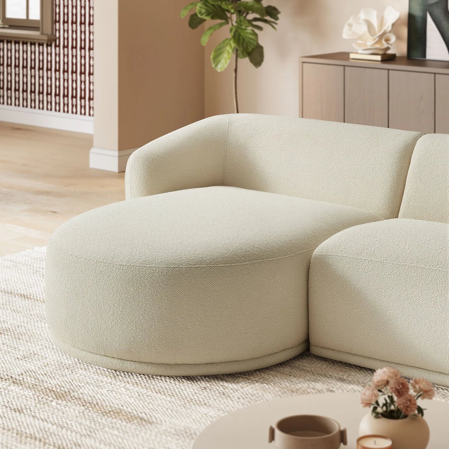 008 SI-2527813 | Lifestyle | Gardner 2 Piece Boucle Modular Sofa with Chaise by Evans & Londeen. Made from boucle fabric in a transitional style.