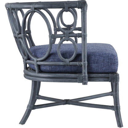 Tegal Chair by Currey and Company in vintage navy, indigo. Made from rattan, plywood, fabric, foam in a coastal style.
