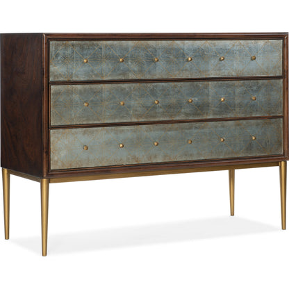 Melange Estrella Three Drawer Chest by Hooker Furniture in dark wood. Made from swirl mahogany with glass, metal in a transitional style.