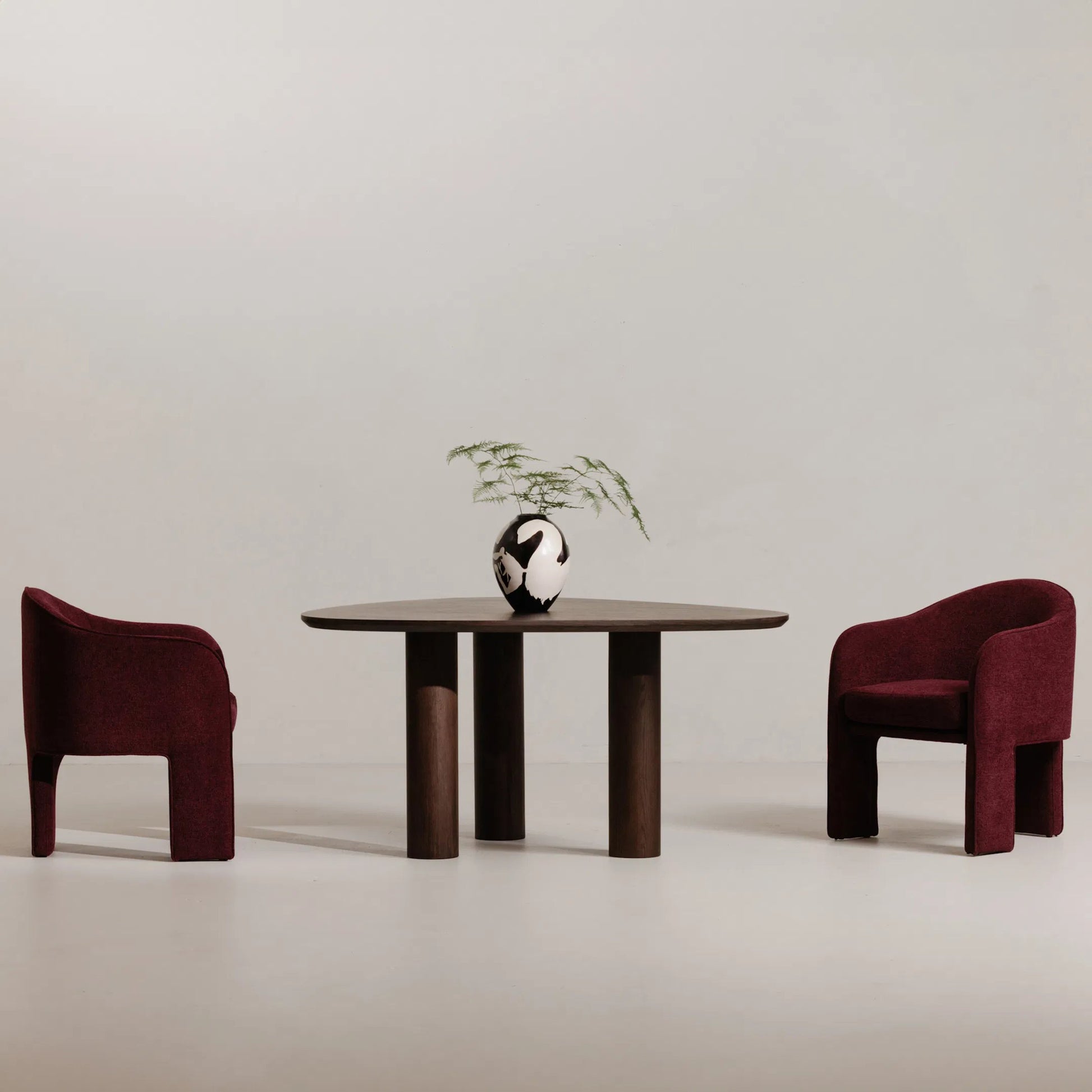 Clara Dining Chair Performance Fabric by Moe's Home Collection in plum. Made from 100% polystery, iron frame, feather fill at top of seat cushion, plywood seat frame in a eclectic & global style.