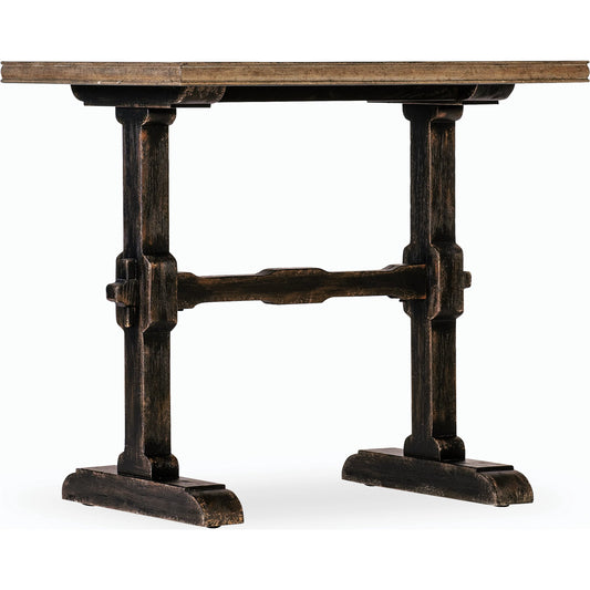Americana Trestle End Table by Hooker Furniture in black and molasses finish. Made from oak veneers with solid-wood edge top in a modern style.