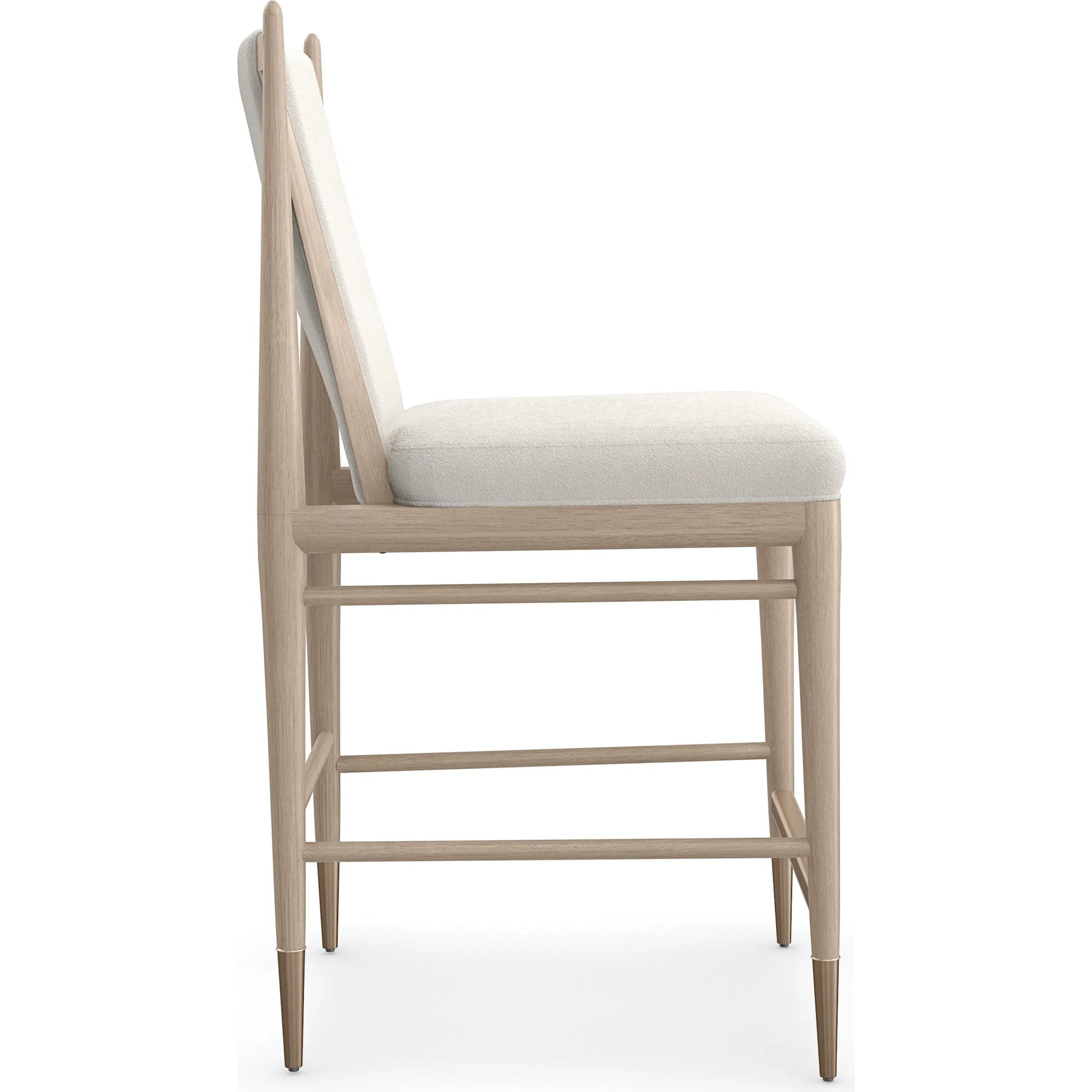 Unity Light Counter Stool by Caracole. Made from oak in a unique style.