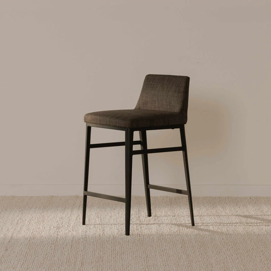 Baron Counter Stool Charcoal by Moe's Home Collection in charcoal gray and powder coated. Made from upholstery: 100% polyester, upholstery foam, steel legs, plywood in a modern style.