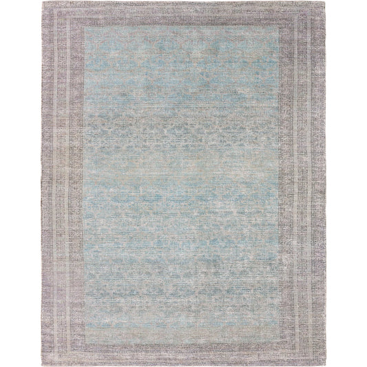 Elaida ELA06 Rug by Jaipur Living in blue, purple. Made from 40% jute 25% polyester 25% cotton 5% wool 5% viscose in a unique style.