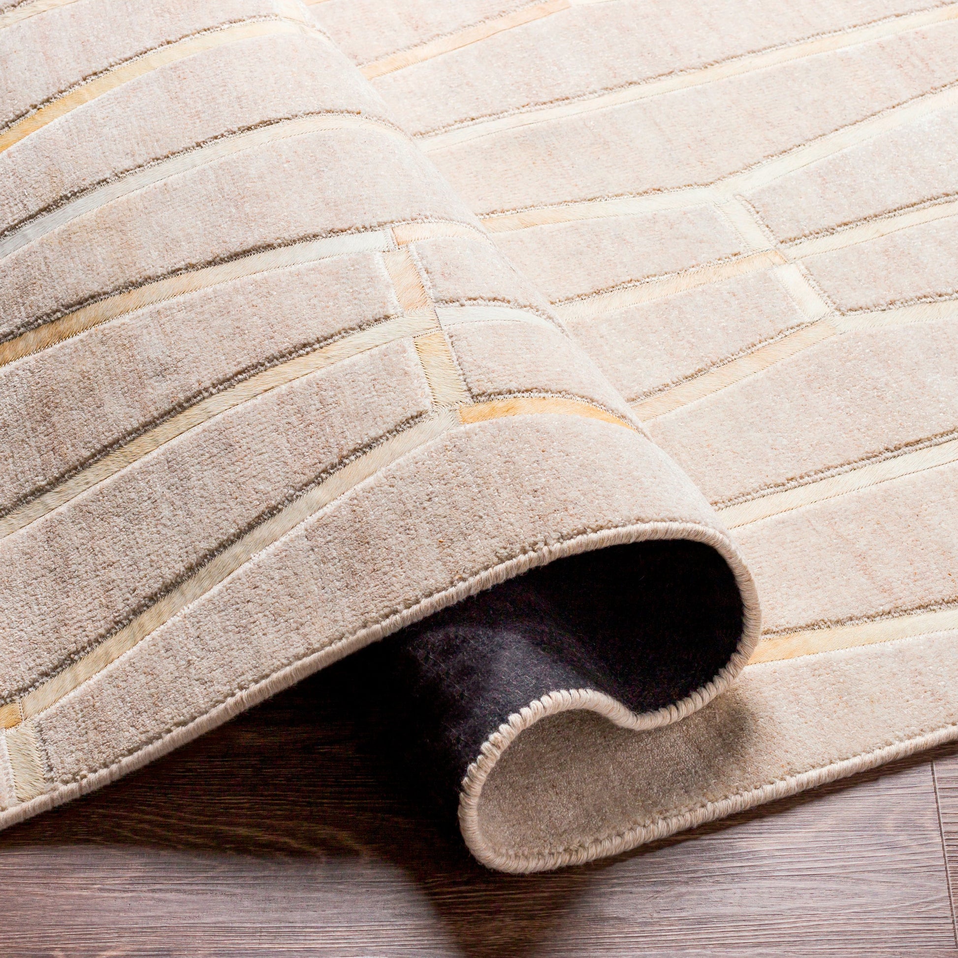 Eloquent ELQ-2302 Rug by Surya in light gray, medium gray, black, gray, charcoal. Made from 80% viscose, 20% leather in a unique style.