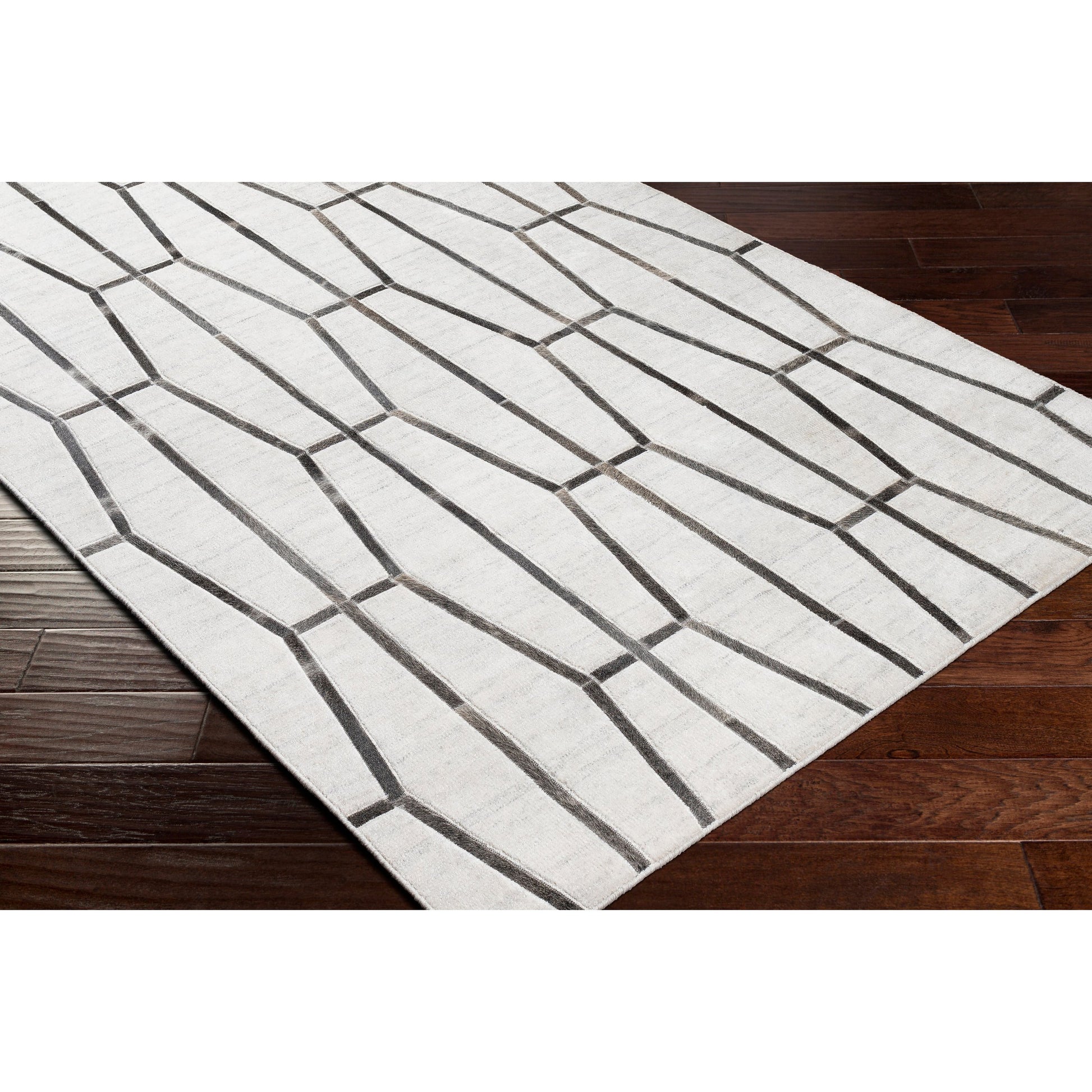 Eloquent ELQ-2302 Rug by Surya in light gray, medium gray, black, gray, charcoal. Made from 80% viscose, 20% leather in a unique style.