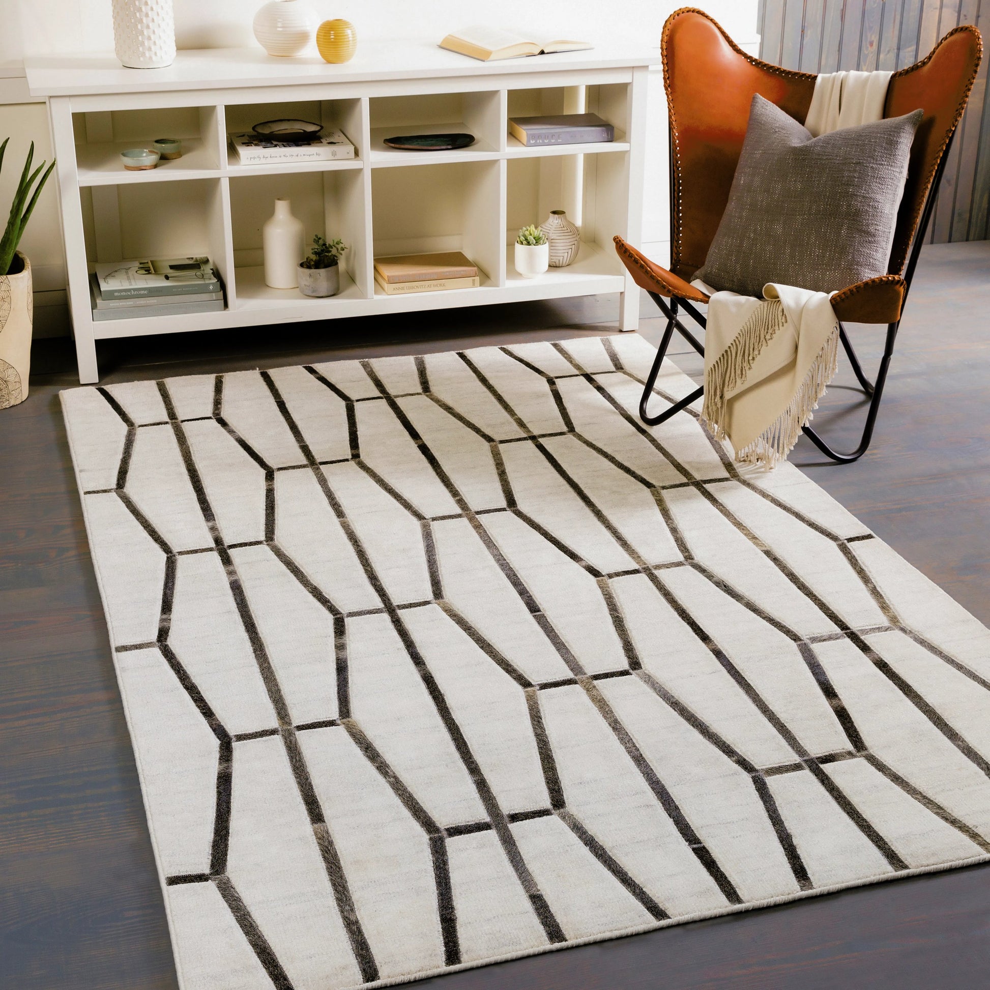 Eloquent ELQ-2302 Rug by Surya in light gray, medium gray, black, gray, charcoal. Made from 80% viscose, 20% leather in a unique style.