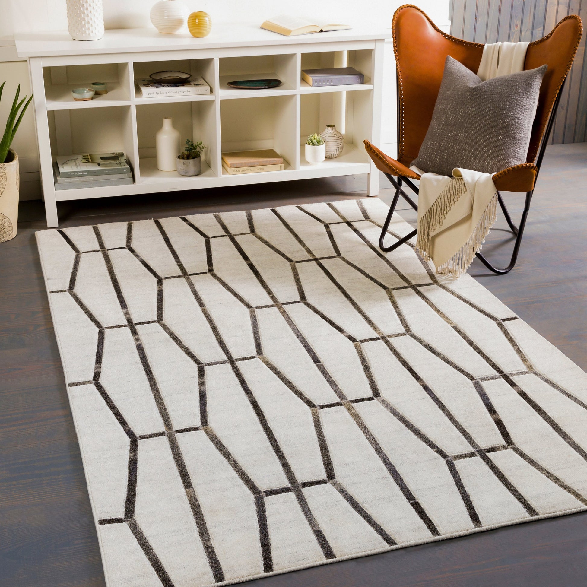 Eloquent ELQ-2302 Rug by Surya in light gray, medium gray, black, gray, charcoal. Made from 80% viscose, 20% leather in a unique style.