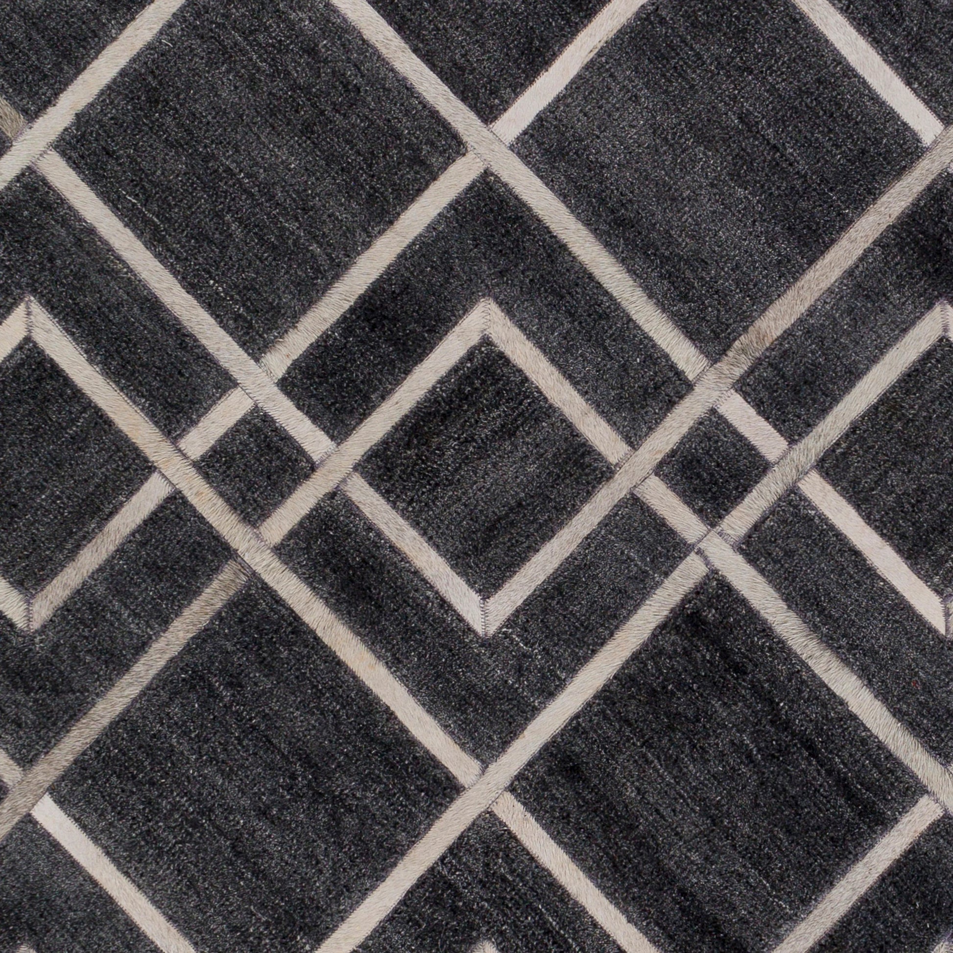Eloquent ELQ-2305 Rug by Surya in black, gray, light gray. Made from 80% viscose, 20% leather in a unique style.