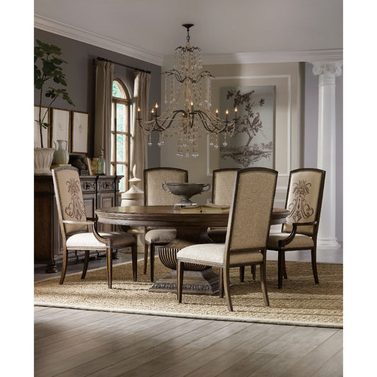 Rhapsody Dining Table by Hooker Furniture in rustic walnut. Made from pecan, hickory, ash, black walnut, maple veneers with resin in a traditional style.