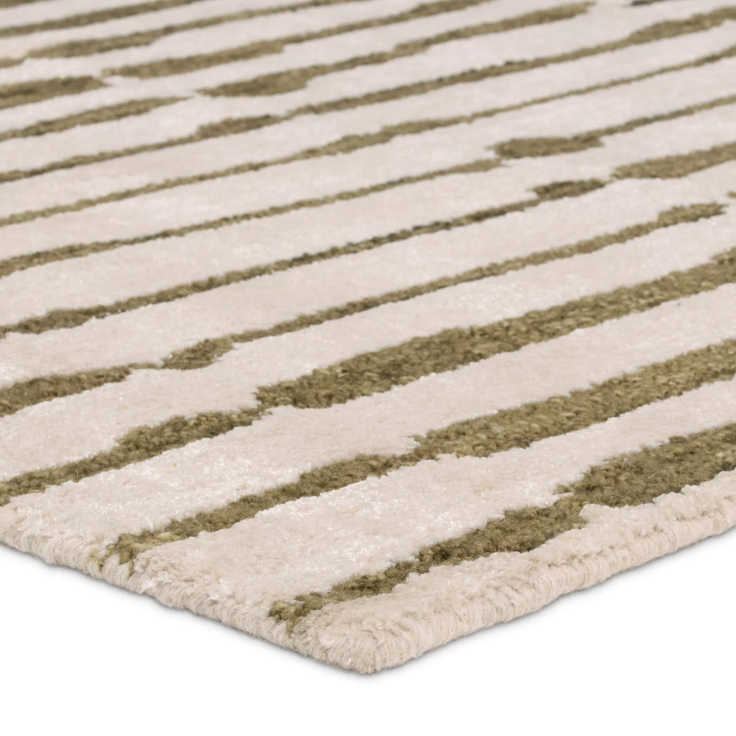 003 SI-2354372,SI-2354373,SI-2354374,SI-2354375,SI-2386082 | Closeup | Etho By Nikki Chu ENK17 Rug by Jaipur Living in green, cream. Made from 70% wool, 30% viscose in a unique style.