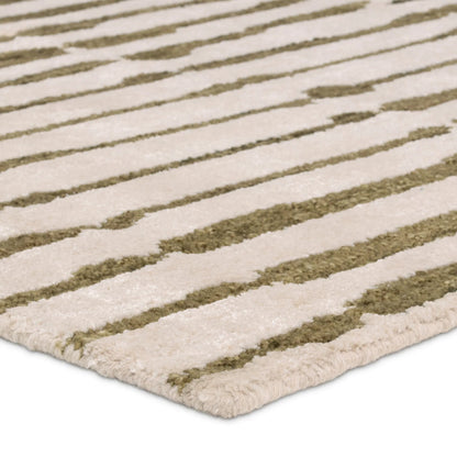Etho By Nikki Chu ENK17 Rug by Jaipur Living in green, cream. Made from 70% wool, 30% viscose in a unique style.