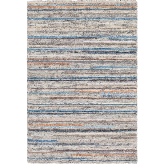 Enlightenment Rug by Surya in light gray, black, dark brown, light blue, burnt orange, charcoal. Made from wool, viscose in a unique style.