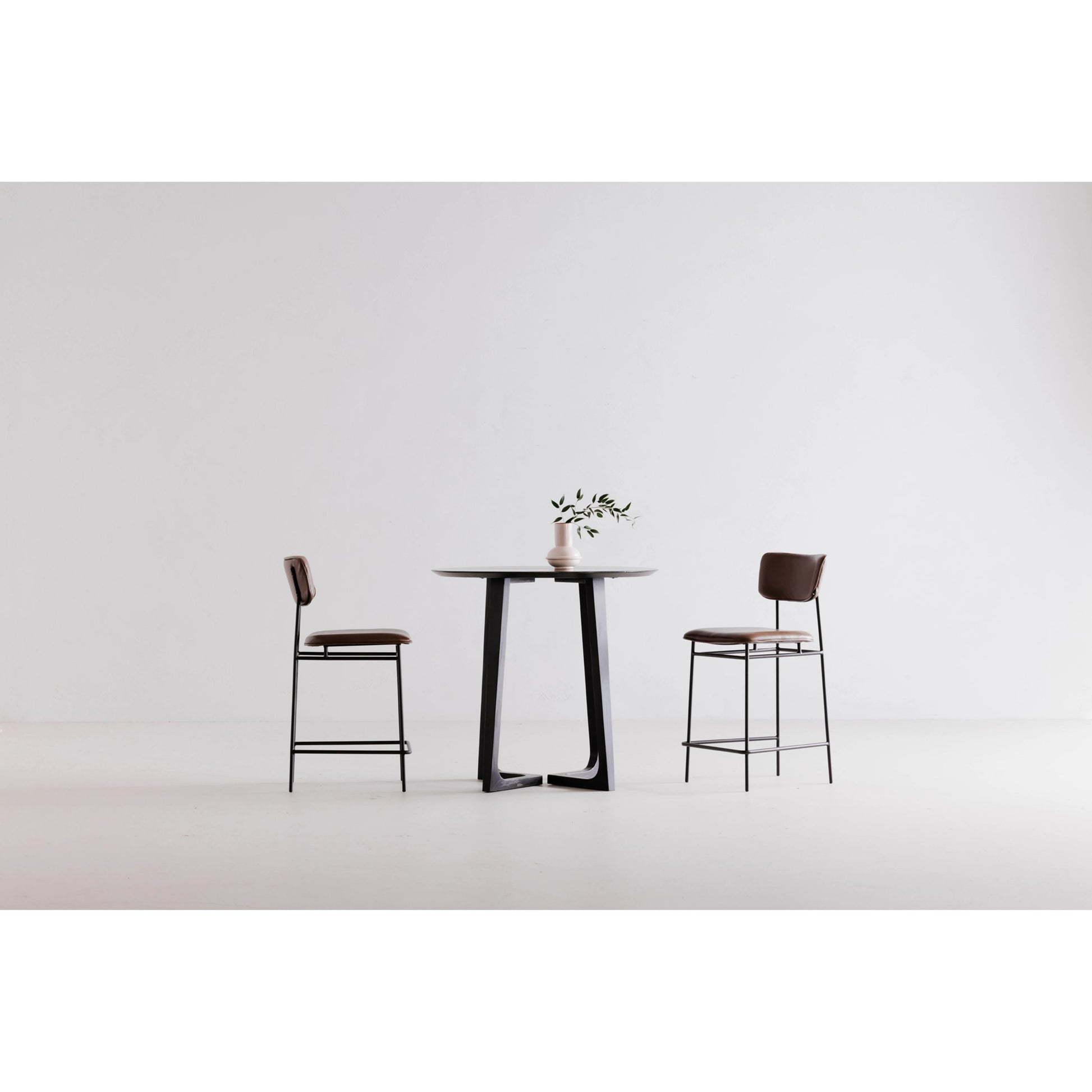 Sailor Counter Stool by Moe's Home Collection in brown. Made from upholstery: 100% top grain leather, powder-coated metal frame, plywood, foam padding in a transitional style.