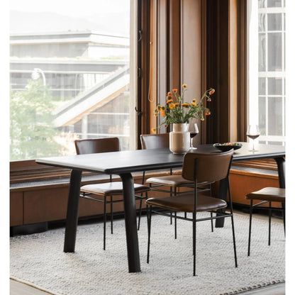 Sailor Dining Chair (Set of 2) by Moe's Home Collection in brown. Made from upholstery: 100% top grain leather, powder-coated metal frame, plywood, foam padding in a transitional style.