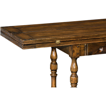 Casual Accents Small Walnut Hunt Table by Jonathan Charles in brown and medium walnut country distressed. Made from acacia in a traditional style.