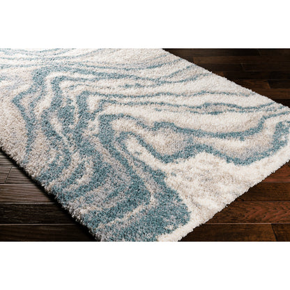 Eskimo Shag by Livabliss in blue, light gray, light beige, cream. Made from 100% polypropylene in a modern style.