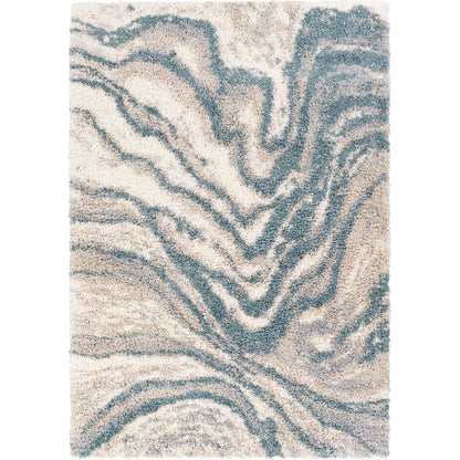 Eskimo Shag by Livabliss in blue, light gray, light beige, cream. Made from 100% polypropylene in a modern style.