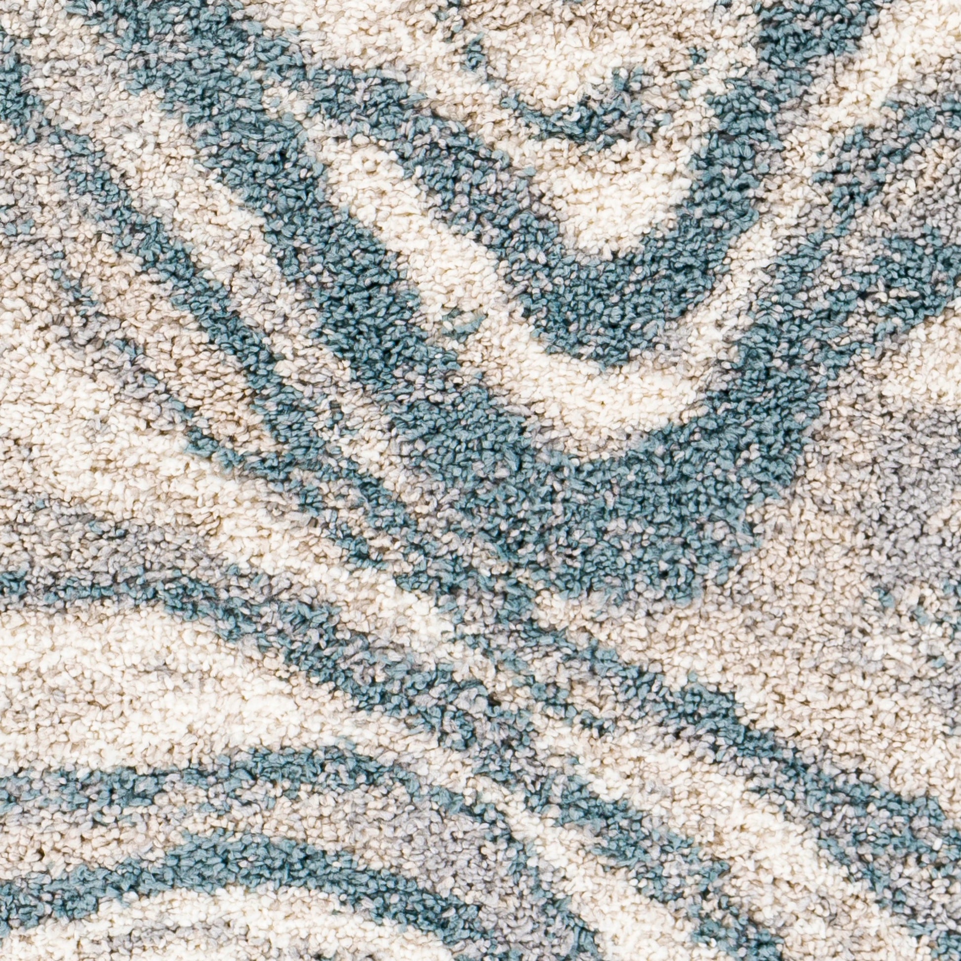 Eskimo Shag by Livabliss in blue, light gray, light beige, cream. Made from 100% polypropylene in a modern style.