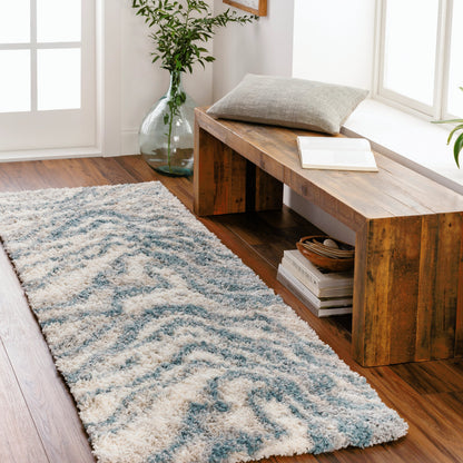 Eskimo Shag by Livabliss in blue, light gray, light beige, cream. Made from 100% polypropylene in a modern style.