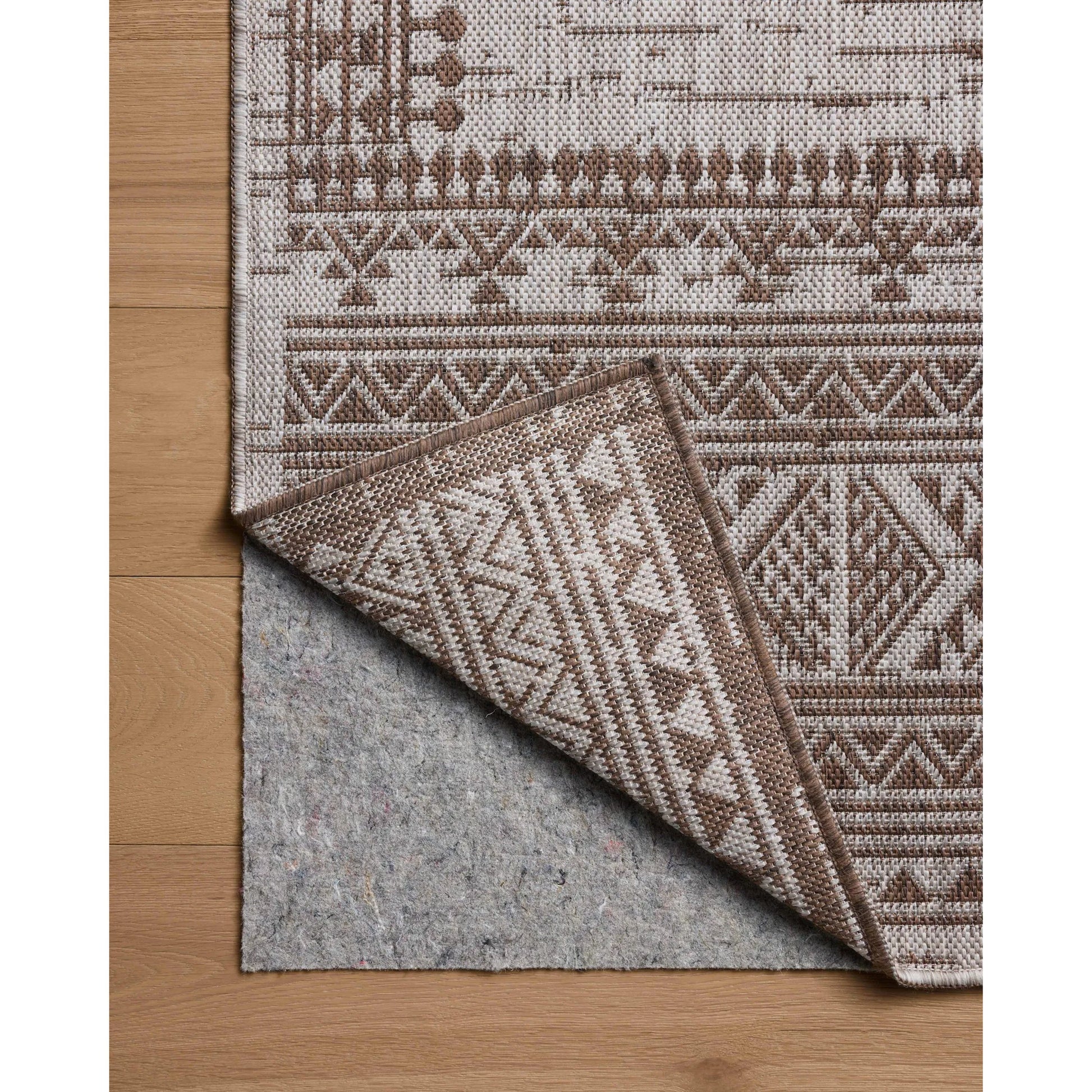 Easton ESN-01 Outdoor Rug by Loloi. Made from 100% polypropylene in a unique style.