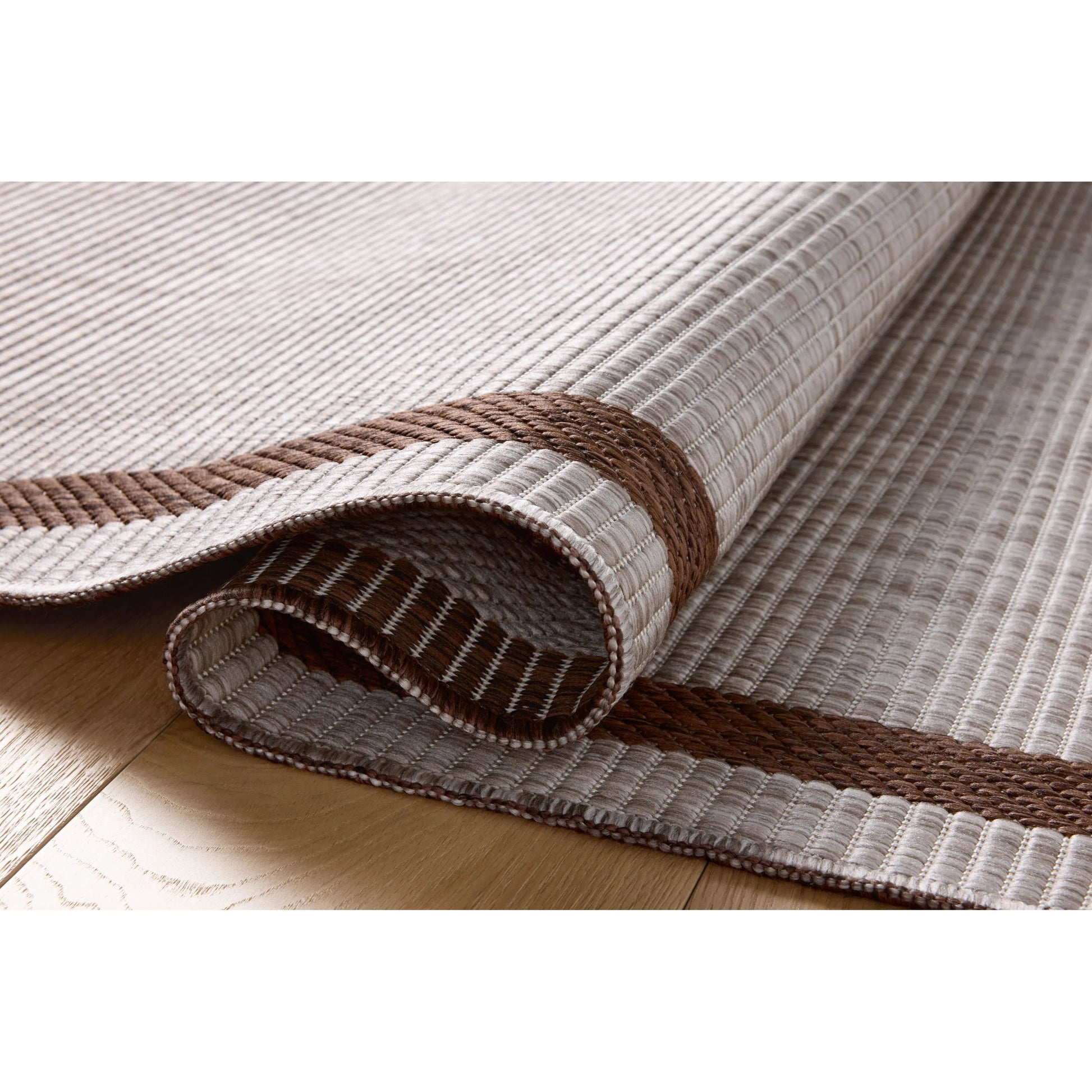 Easton ESN-02 Outdoor Rug by Loloi in dove, coffee. Made from 100% polypropylene in a unique style.