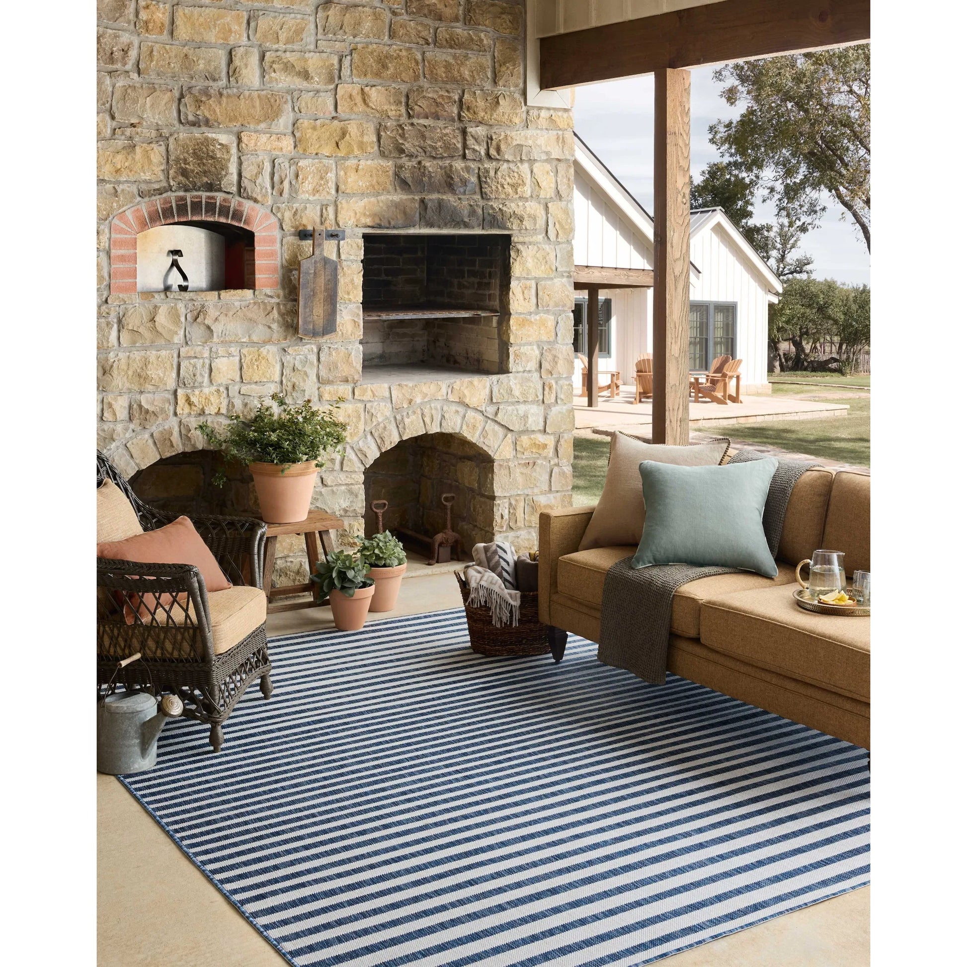 Easton ESN-03 Outdoor Rug by Loloi in denim, ivory. Made from 100% polypropylene in a unique style.