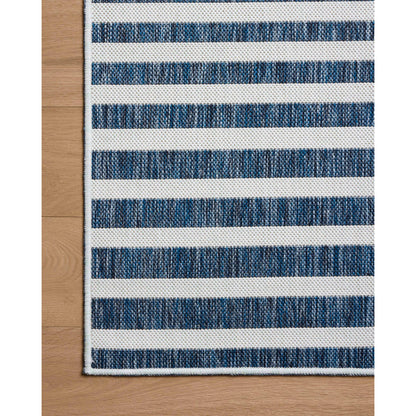 Easton ESN-03 Outdoor Rug by Loloi in denim, ivory. Made from 100% polypropylene in a unique style.